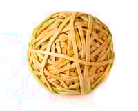 Ball of rubber bands isolated over a white background